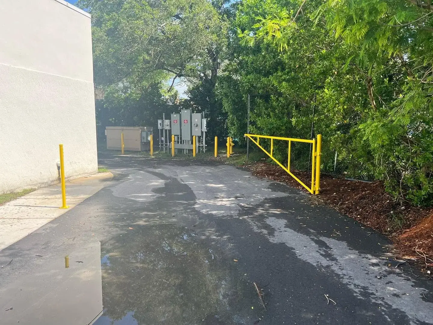 Yellow safety guard rail and bollards installed in Miami