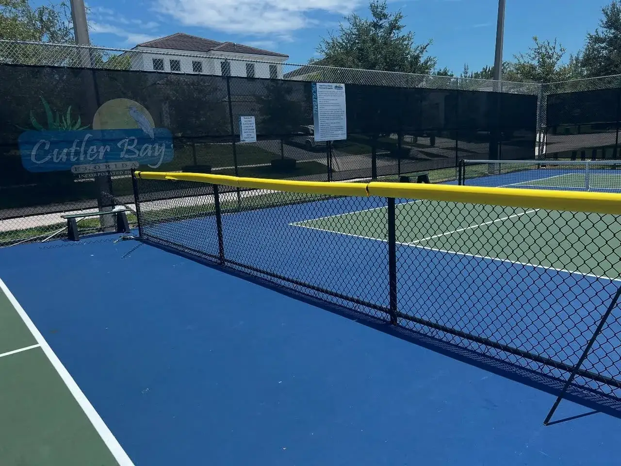 Padded chain link fence around a Miami-Dade pickleball court